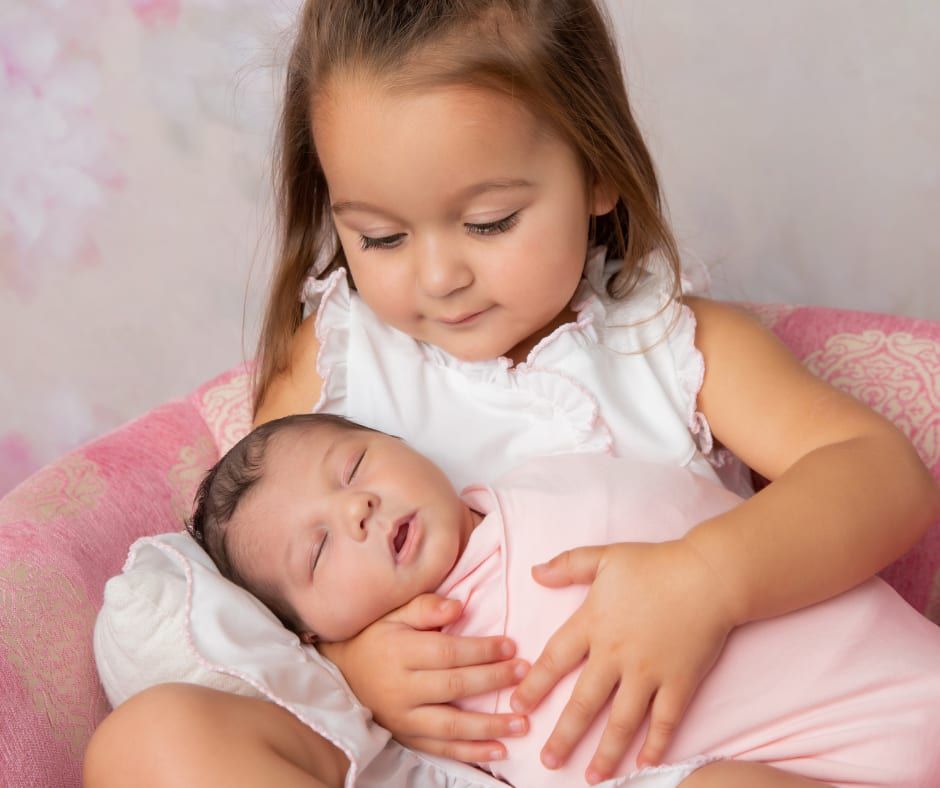 Newborn Care Specialist With Baby