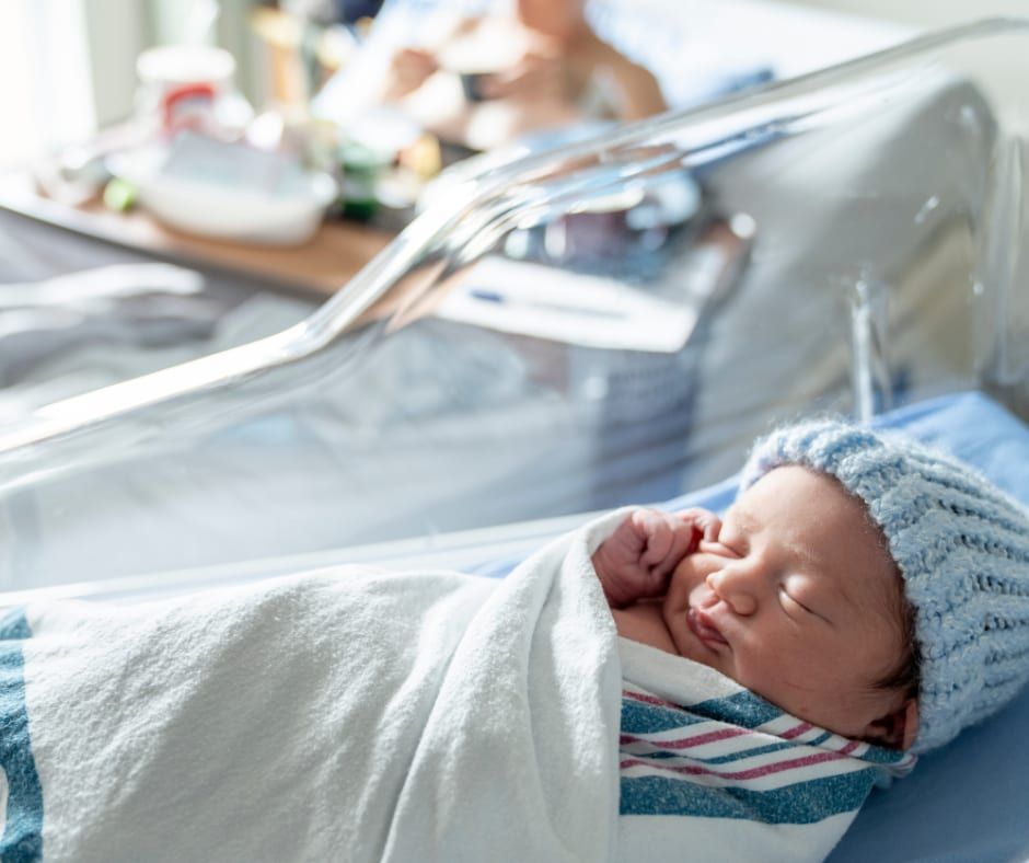 Newborn Care Specialist With Baby